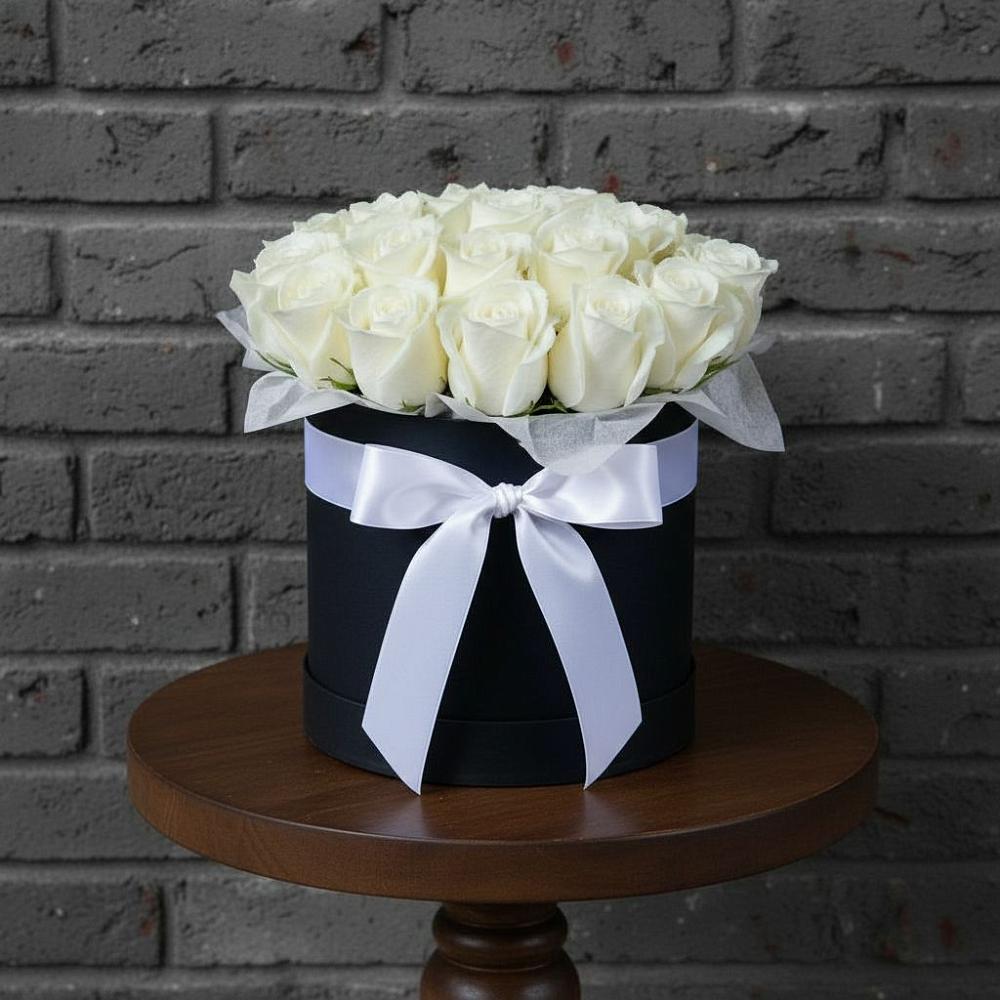 Цветочная композиция из Розы в шляпной коробке в Советске Кировской области